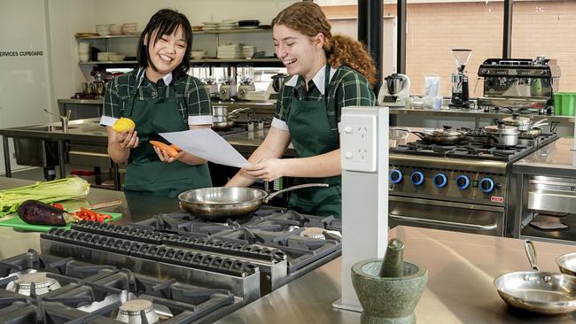 Tami and Grace in the food tech kitchen. Picture: Mike Burton