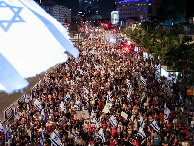 Relatives and supporters of Israelis taken hostage by Palestinian militants in Gaza in the October 7 attacks, demonstrate calling for their release in the Israeli coastal city of Tel Aviv on June 22. Picture: AFP