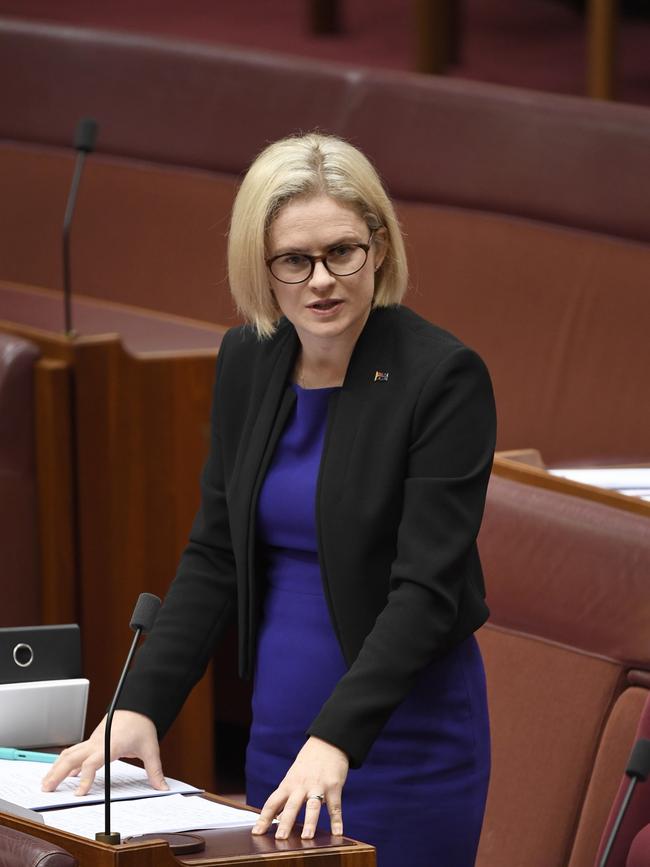 Stoker speaking in the Senate chamber.