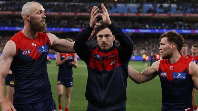 Retiring Melbourne defender Michael Hibberd was supported by teammates as he bid farewell to fans after being dropped following the qualifying final. Picture: Michael Klein