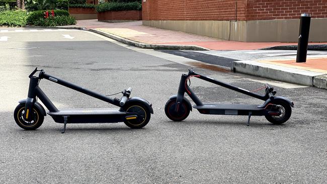 Segway Ninebot scooter left, Xiaomi scooter right – handlebars folded