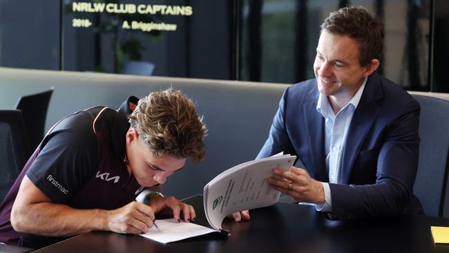 Reece Walsh and Broncos CEO, Dave Donaghy, Reece signing his extended contract with the Brisbane Broncos, Red Hill. Picture: Liam Kidston