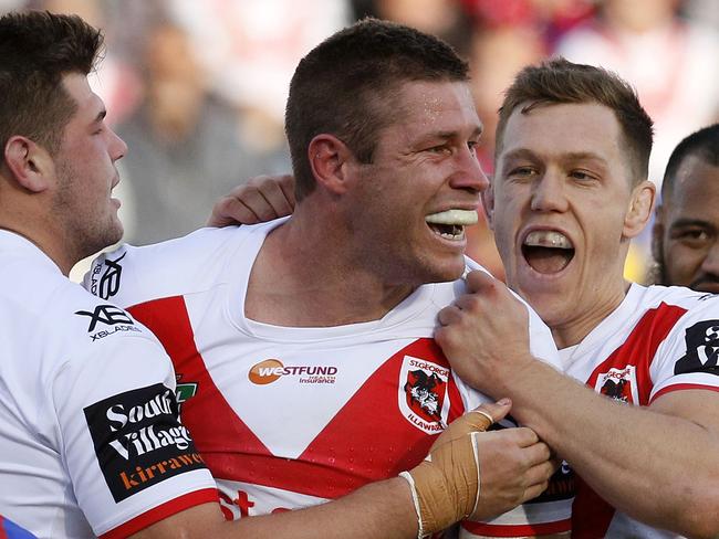 Jeremy Latimore of the Dragons celebrates scoring a second-half try during the Round 25 NRL match between the Newcastle Knights and the St George-Illawarra Dragons at McDonald Jones Stadium in Newcastle, Saturday, September 1, 2018. (AAP Image/Darren Pateman) NO ARCHIVING, EDITORIAL USE ONLY