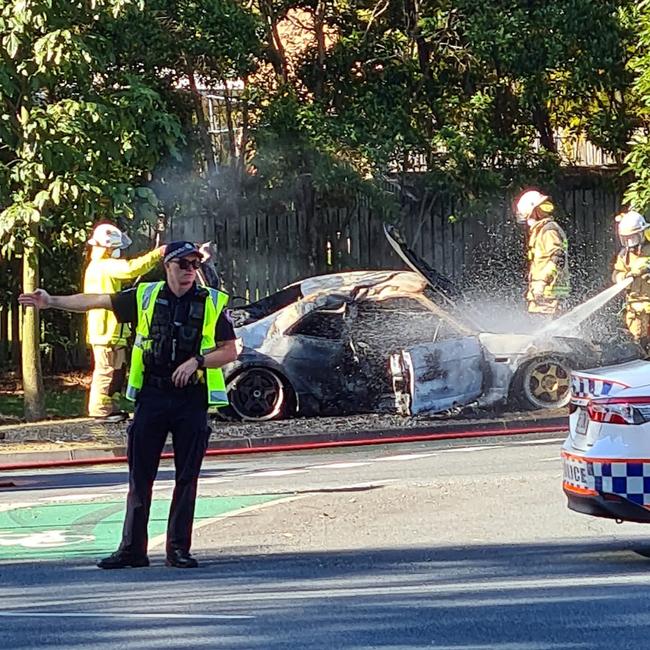 A Queensland Police officer directs traffic after the crash. Picture: Facebook/Kel Belle