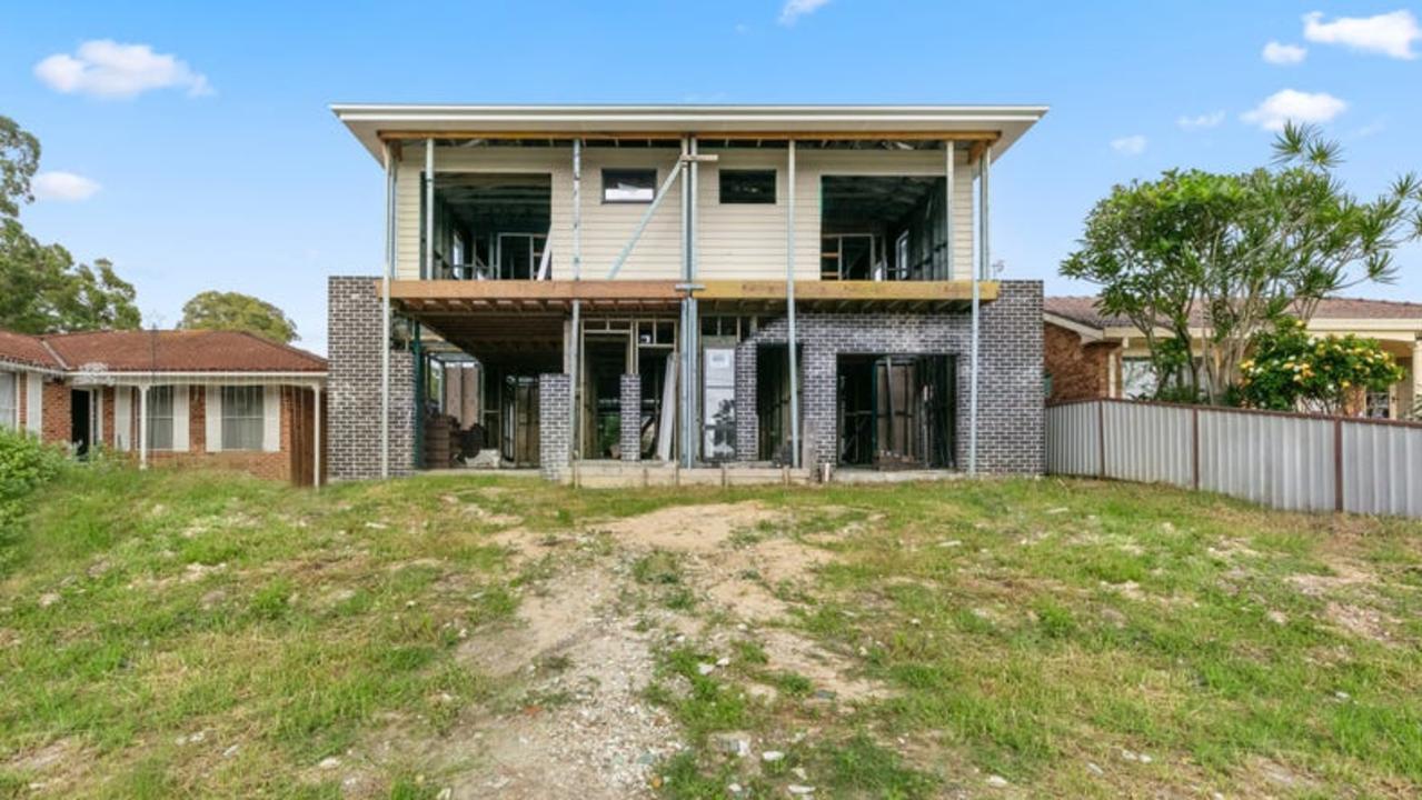 This Gymea Crescent home in the Central Coast suburb of Mannering Park is an incomplete house that sold for $700,000.
