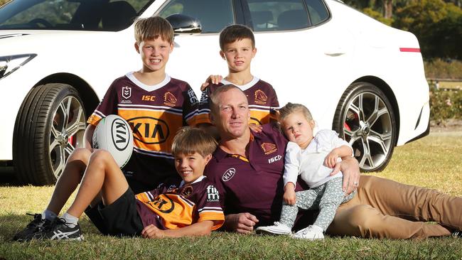 File picture of Darren Lockyer and his four children, all of whom are now in school. Picture: Liam Kidston.