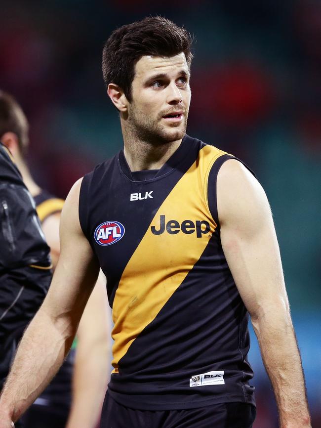 Trent Cotchin leaves the field after the round 23 loss to the Sydney Swans. Picture: Getty Images