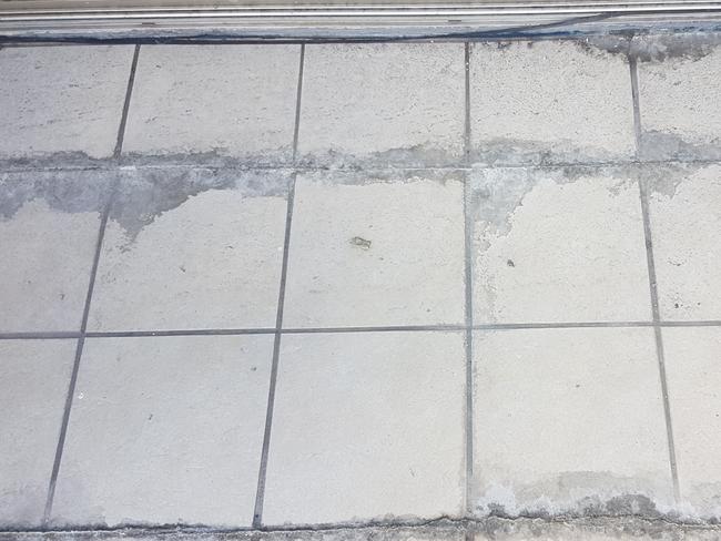 The tiles in this Newcastle building complex show substandard waterproofing.