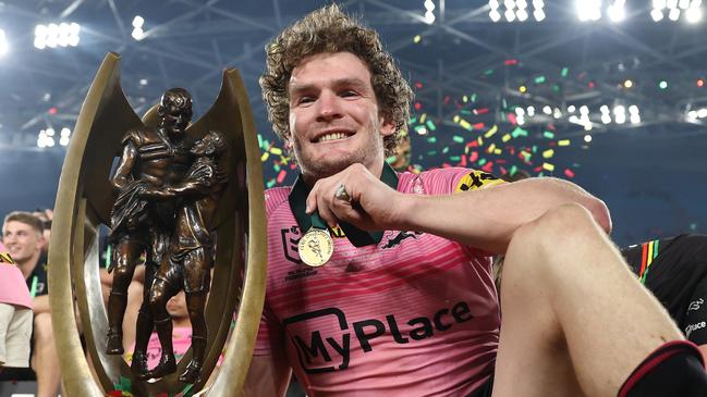 SYDNEY, AUSTRALIA - OCTOBER 06:  Liam Martin of the Panthers poses with the Provan-Summons Trophy after winning the 2024 NRL Grand Final match between the Melbourne Storm and the Penrith Panthers at Accor Stadium on October 06, 2024, in Sydney, Australia. (Photo by Cameron Spencer/Getty Images)