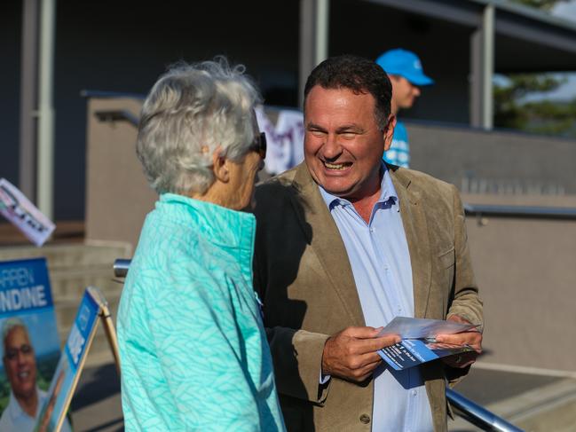 Independent candidate for Gilmore, Grant Schultz talking with voters in Kiama. Photo: Wesley Lonergan.