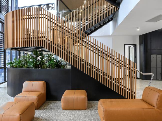 Staircase and one of several seating spaces inside the Inquiry and Innovation Hub.