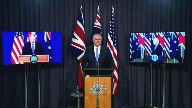 Prime Minister Scott Morrison, US President Joe Biden, and UK Prime Minister Boris Johnson hold a press conference to announce a new defence agreement