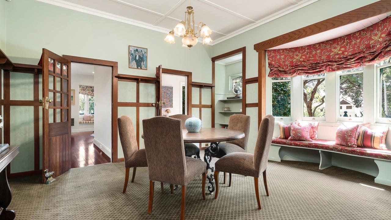 The dining space is filled with natural light.