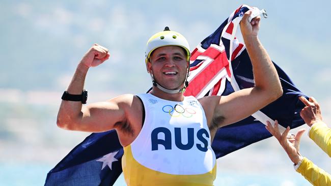 MARSEILLE, FRANCE - AUGUST 03: Grae Morris of Team Australia celebrates winning the Silver medal in the Men's Windsurf iQFoil class final on day eight of the Olympic Games Paris 2024 at Marseille Marina on August 03, 2024 in Marseille, France. (Photo by Clive Mason/Getty Images)