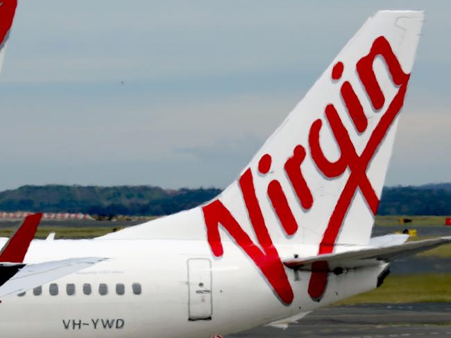 SYDNEY, AUSTRALIA - NewsWire Photos - SEPTEMBER 09, 2022: General generic editorial stock image of Virgin airplane at Sydney Domestic Airport. Picture: NCA NewsWire / Nicholas Eagar