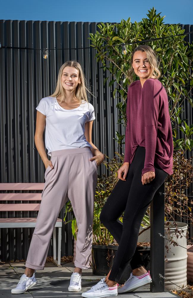 Back to basics! Models Zoe Cavedon and Zoe Donne, wearing loungewear outfits by Intimo teamed with Volley sneakers at Good Times Milk Bar. Picture: Jake Nowakowski