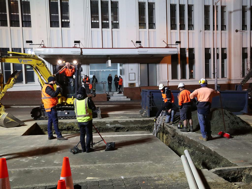 Work in Macquarie Street Hobart on the hole that will house the chamber performance artist Mike Parr will live in for 72 hours during Dark Mofo. Picture: NIKKI DAVIS-JONES