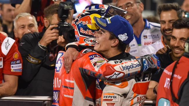 Marc Marquez and Andrea Dovizioso celebrate their latest last-lap battle. Pic: MotoGP.com