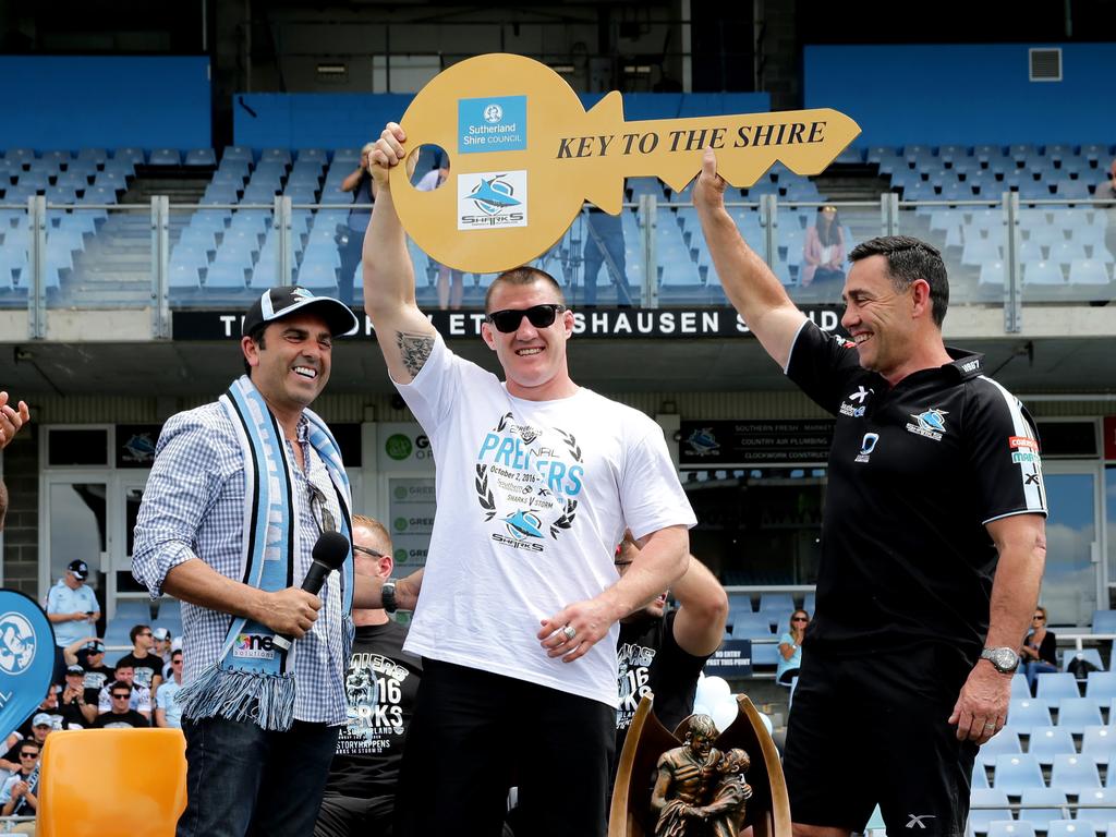 Paul Gallen and coach Shane Flanagan receive the keys to the shire during the Cronulla Sharks fan day at Shark Park, after they won the 2016 NRL grand Final . Picture: Gregg Porteous