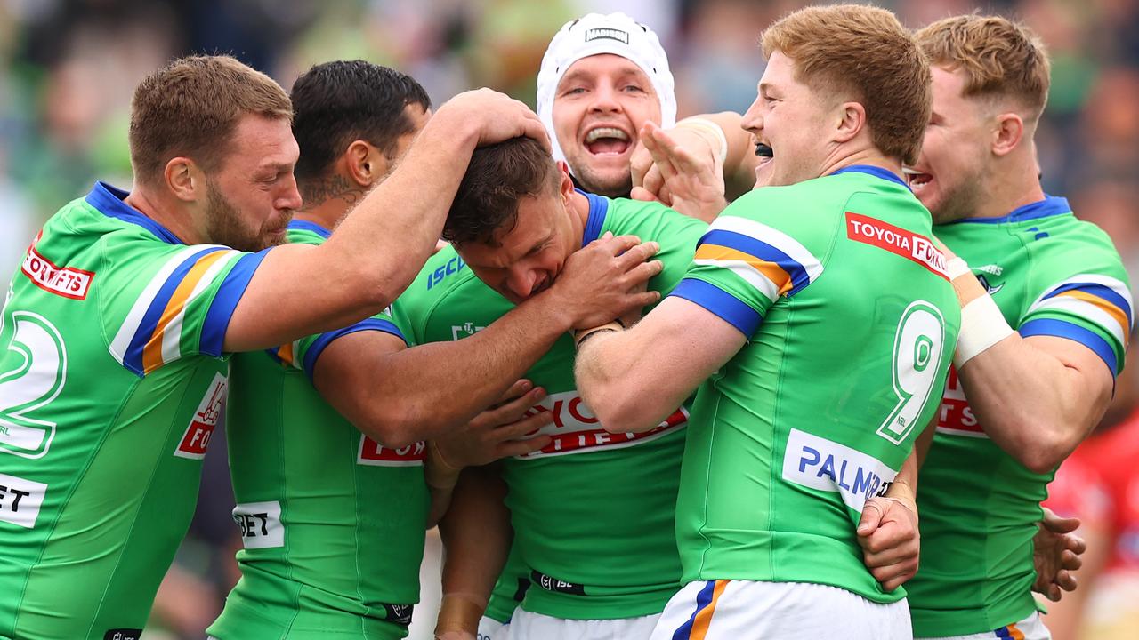 WAGGA WAGGA, AUSTRALIA - APRIL 29: Jack Wighton of the Raiders celebrates scoring a try with teammates during the round nine NRL match between the Canberra Raiders and Dolphins at McDonalds Park on April 29, 2023 in Wagga Wagga, Australia. (Photo by Mark Nolan/Getty Images)