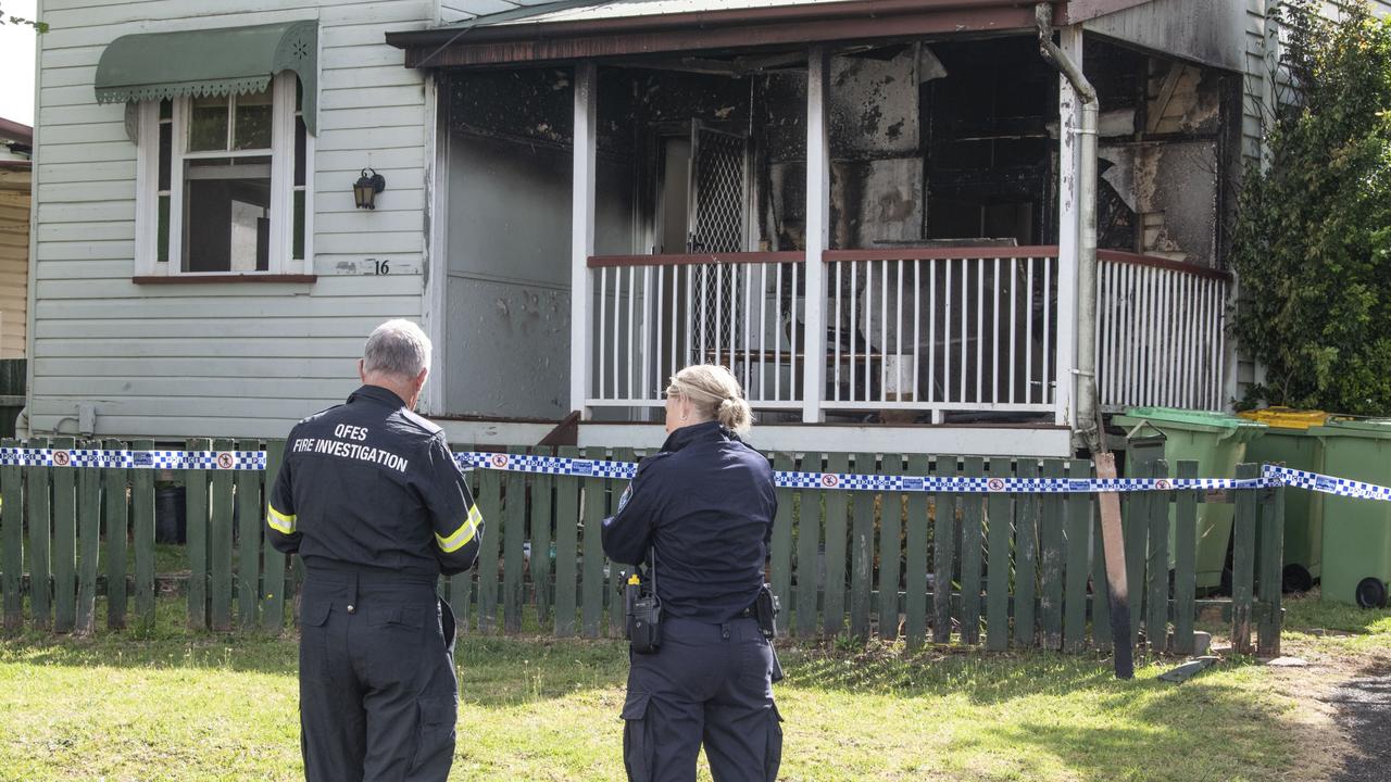 QFES fire investigation and QPS scenes of crime investigate a house fire in Link St, North Toowoomba. Starting around 5am on New Year's Day, 3 occupants escaped without injury. Sunday, January 1, 2023. Picture: Nev Madsen.