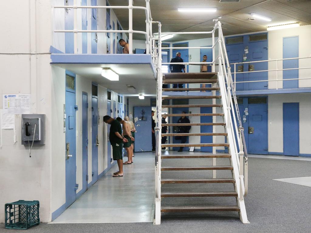 Corrective Services officers raid cells at Silverwater Jail looking for contraband. The officers now wear body cams that record the raids. Picture: Richard Dobson