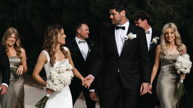 Amy Taeuber and Dale Spurway-Humphries with bridal party. Picture: Christina Toulantas