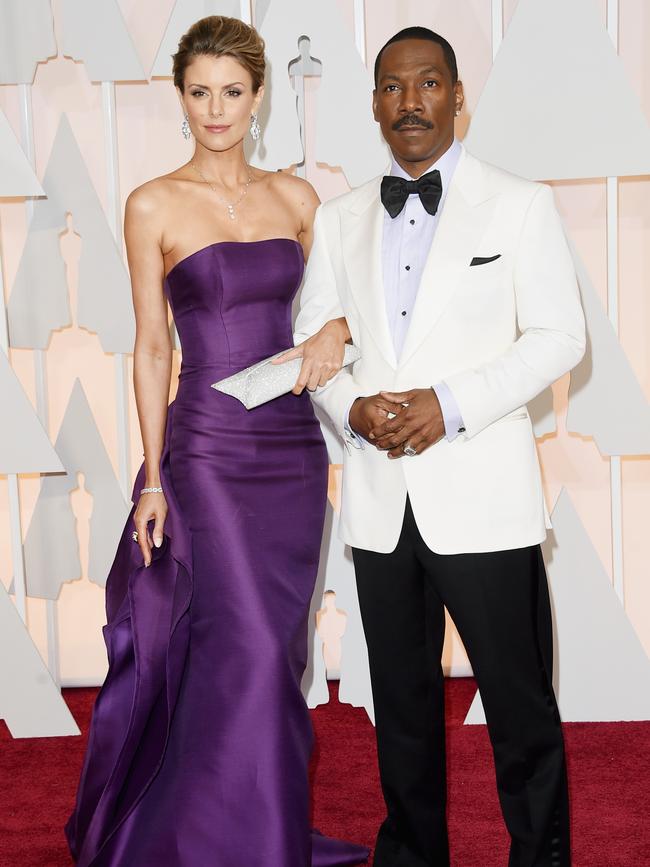 Eddie Murphy and Paige Butcher attend the Oscars 2015 red carpet. Picture: Getty
