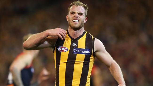 Tom Mitchell feels for his shoulder after being bumped. Picture: Phil Hillyard