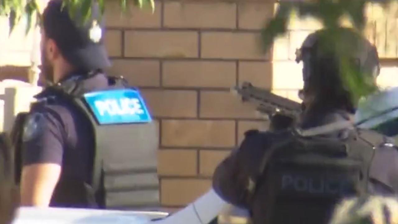 Heavily armed police have been seen at the quiet street. Picture: 7 News