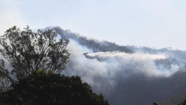 Waterbombing aircraft are being used to battle the Kilkivan blaze.