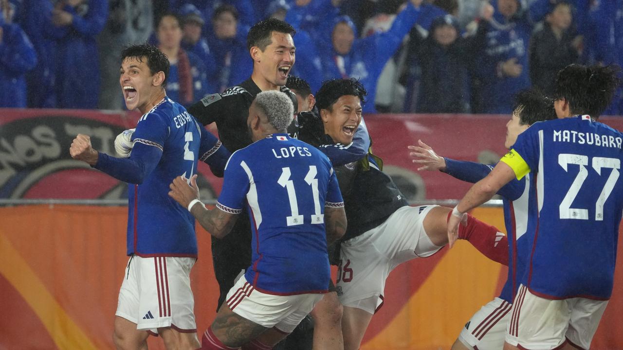 Yokohama players celebrate after beating Ulsan in a penalty shootout. (Photo by Masashi Hara/Getty Images)
