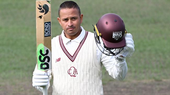 HOBART, AUSTRALIA - MARCH 06: Usman Khawaja of Queensland celebrates scoring a century during the Sheffield Shield match between Tasmania Tigers and Queensland Bulls at Blundstone Arena, on March 06, 2025, in Hobart, Australia. (Photo by Steve Bell/Getty Images)