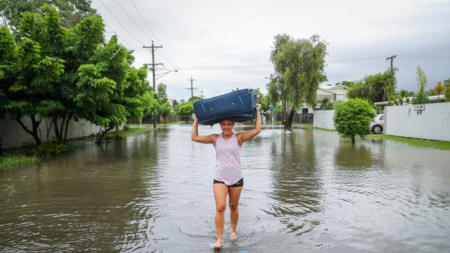 Megan Simmonds evacuates from her Rosslea home before helping others. Picture: Michael Chambers