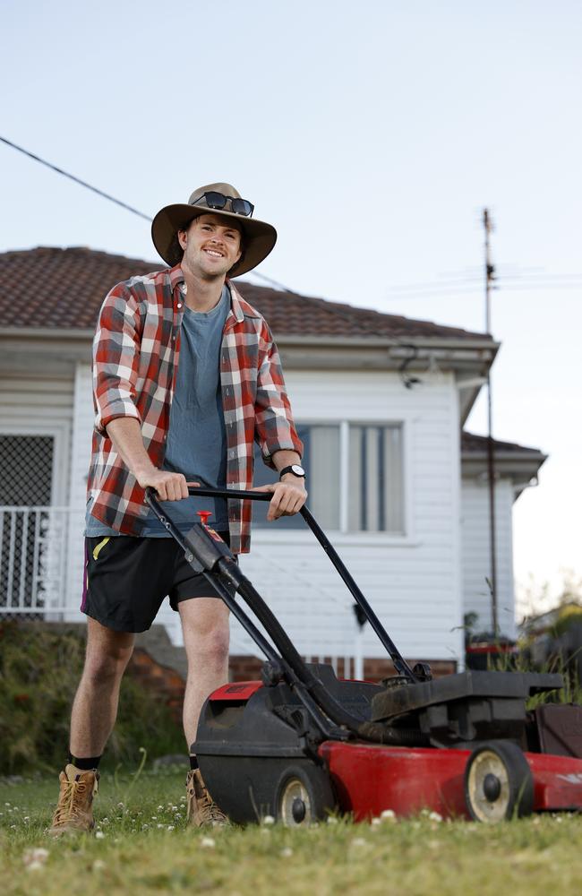 Joe Stewart, 22, from Port Kembla who loves to mow his lawn. Picture: Jonathan Ng