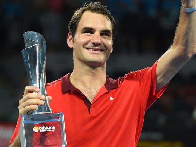 Roger Federer of Switzerland reacts after winning the Mens final against Milos Raonic of Canada at the Brisbane International Tennis Tournament in Brisbane, Sunday, Jan 11, 2015. (AAP Image/Dave Hunt) NO ARCHIVING, EDITORIAL USE ONLY