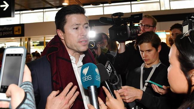 Former Melbourne footballer Andrew Leoncelli in the arrivals terminal. Picture: Jake Nowakowski