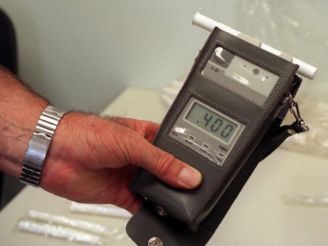 23/01/1998 NEWS: Breathalyser random breath testing (RBT) unit used to test drivers for drink driving. Breath test.