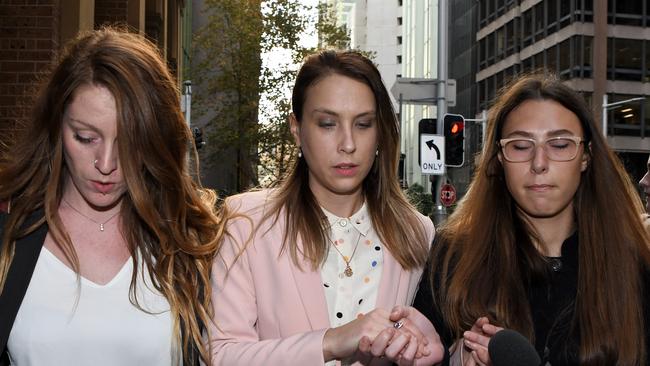 Hannah Quinn (centre) on Friday leaving Sydney’s Supreme Court.