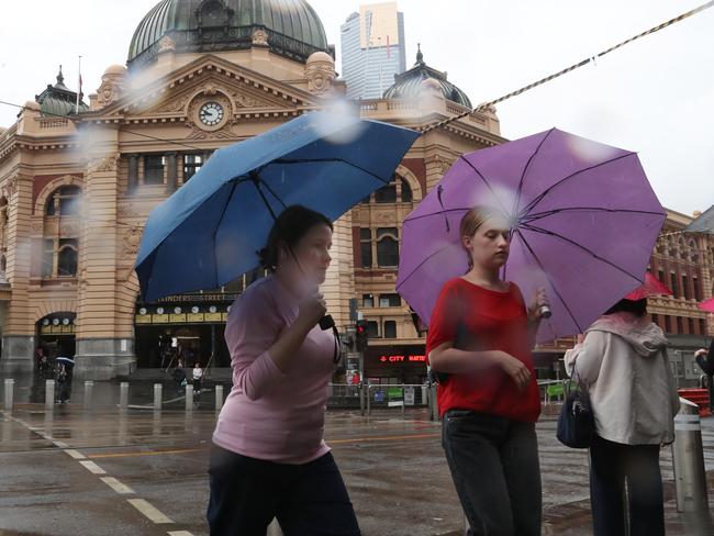 The rain is expected to continue on Sunday. Picture: David Crosling