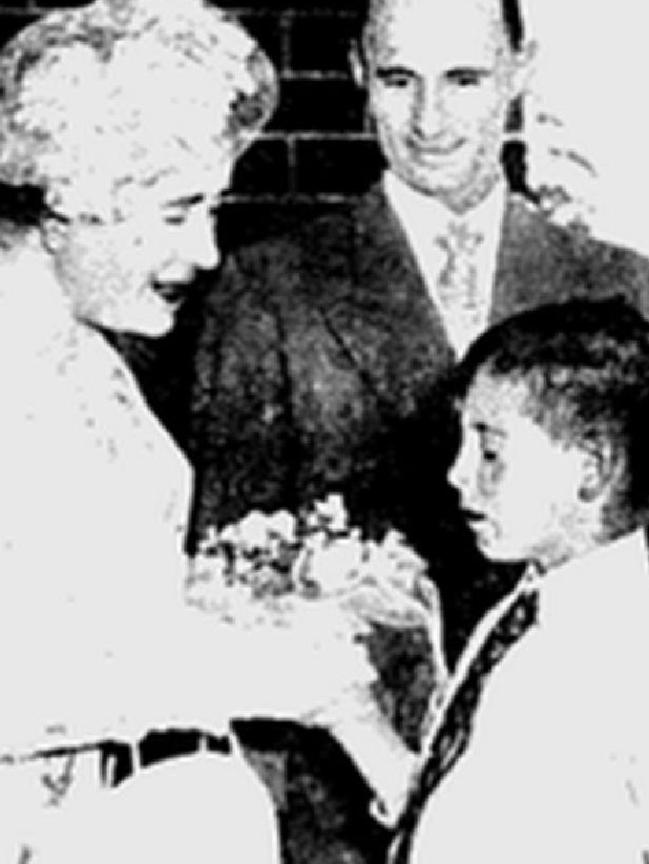 Dennis Ferguson presenting a posy to the Queen Mother in 1958. Picture: Sydney Morning Herald