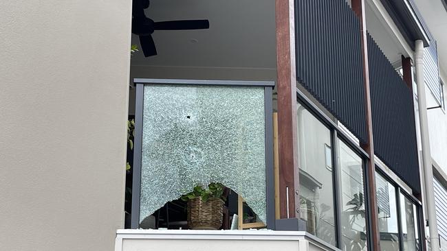 A broken shade of glass on a balcony at a Morningside townhouse complex. Picture: Matthew Johnston