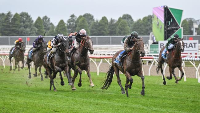 Just Folk (white and orange cap) and Young Werther (blue and white checks) came together over the concluding stages of the Ballarat Cup. Picture: Reg Ryan/Racing Photos via Getty Images