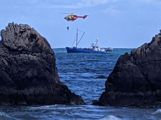 Stricken sailor rescued in rough seas