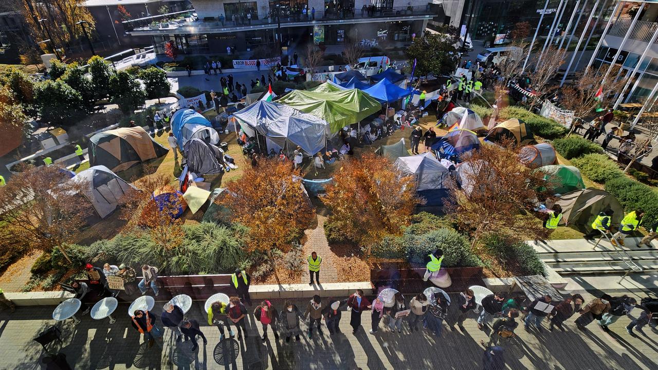 Protesters were told to vacate the encampment on the Kambri lawns on Monday morning. Picture: NewsWire/ Martin Ollman