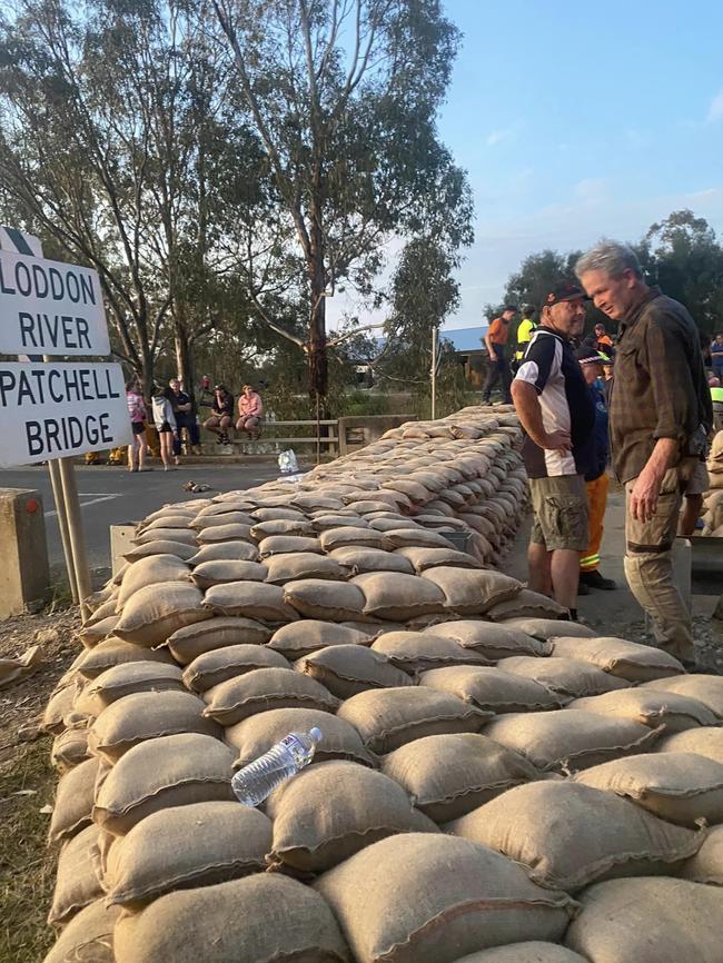 Locals helped build the levee. Picture: Kerang Fire Brigade / Facebook