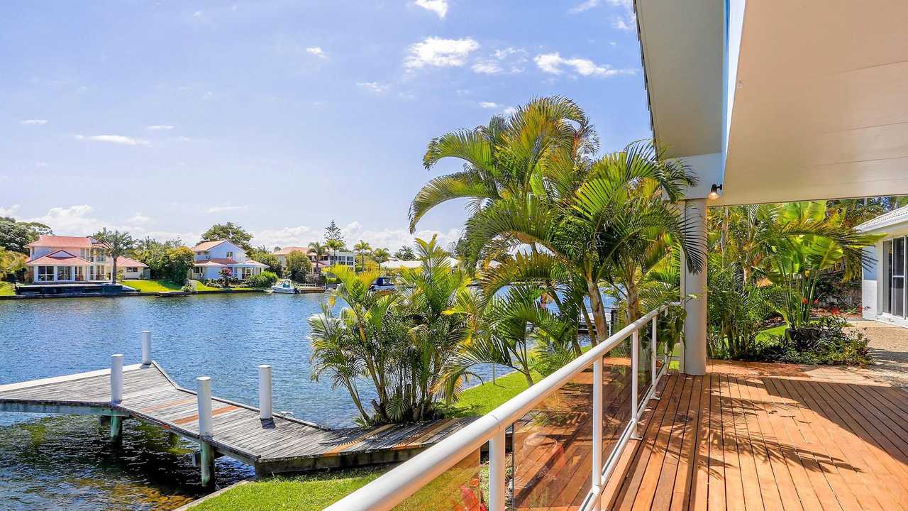 A single-level, four-bedroom waterfront house at 22 Seamount Quay, Noosa Waters, goes to auction Saturday at 11am. Picture: Fletcher Photography PTY Ltd