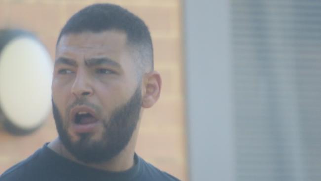 Madyn 'Mick' Kassem, 29, of Granville, leaving Wyong Local Court where he pleaded guilty to intimidation, aggravated enter dwelling and demanding property with menaces after he tried to evict a guest at The Entrance Motel. Picture: NewsLocal