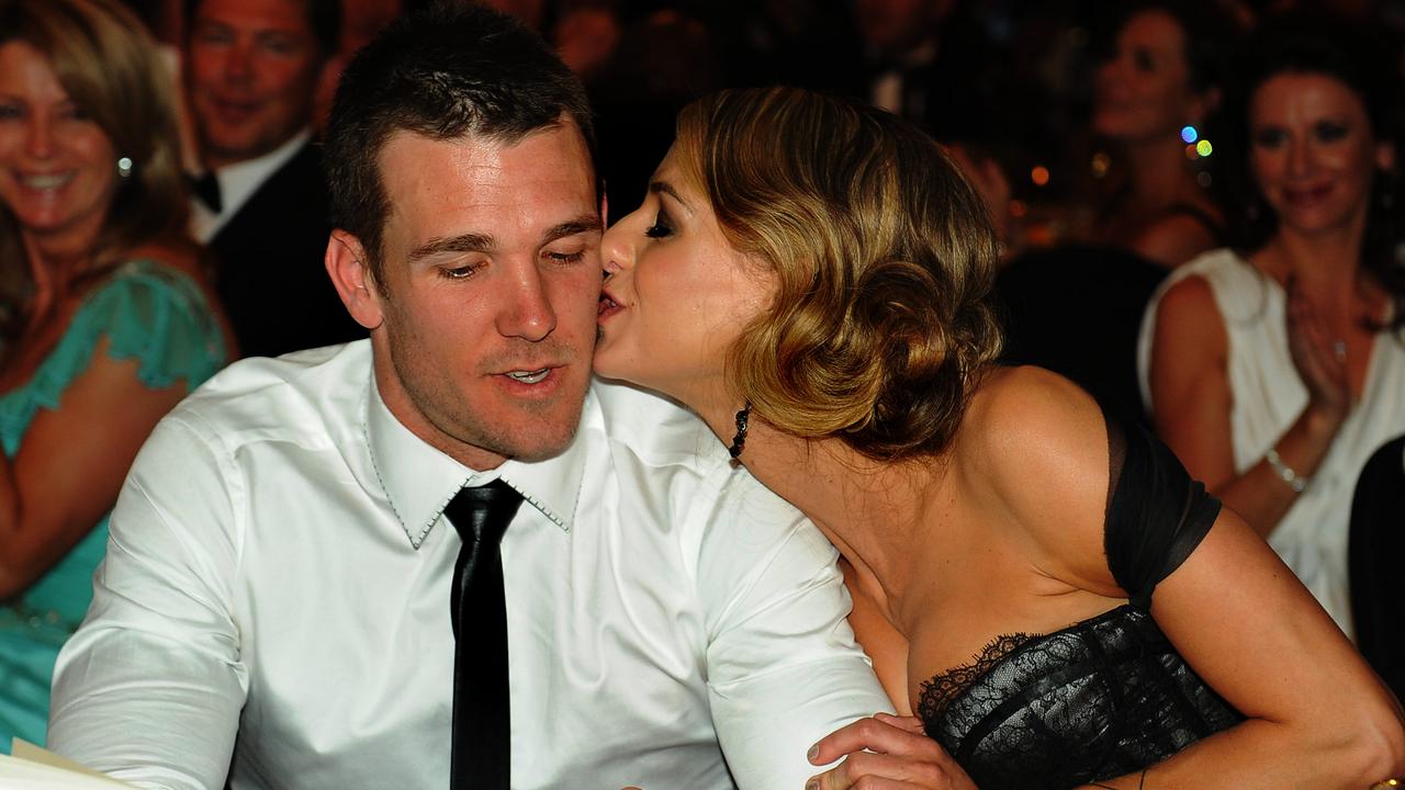 2011 Brownlow Medal. Winner Dane Swan kisses partner Taylor Wilson