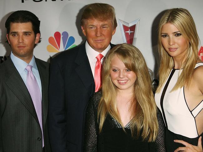 Donald Trump with his son Donald Trump Jr. and daughters Tiffany and Ivanka Trump in 2006.